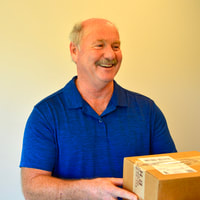 photo of a man delivering a package